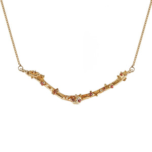 14ct gold twig necklace set with nine colorful Sapphires