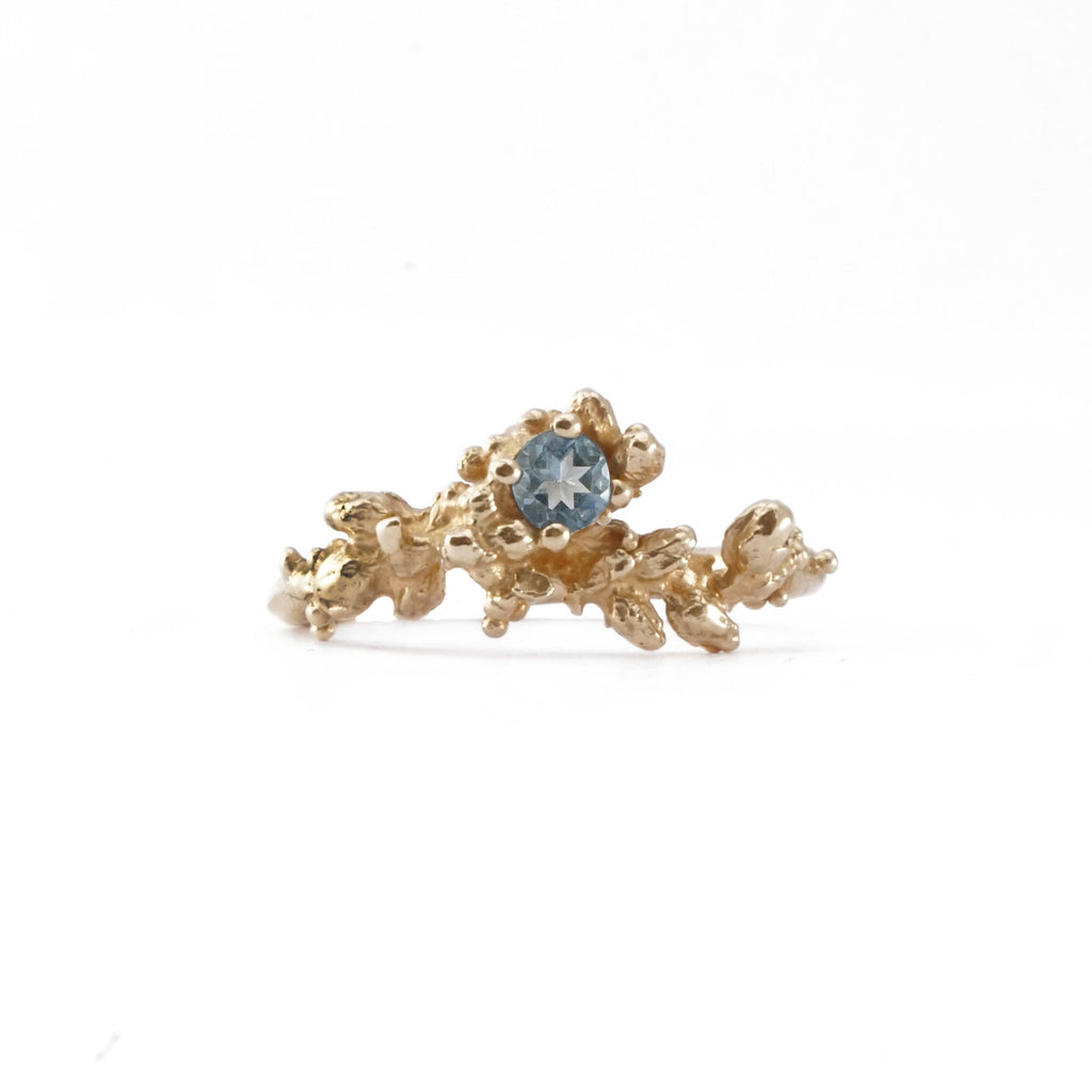 14ct Gold Flowers buds ring set with round Aquamarine