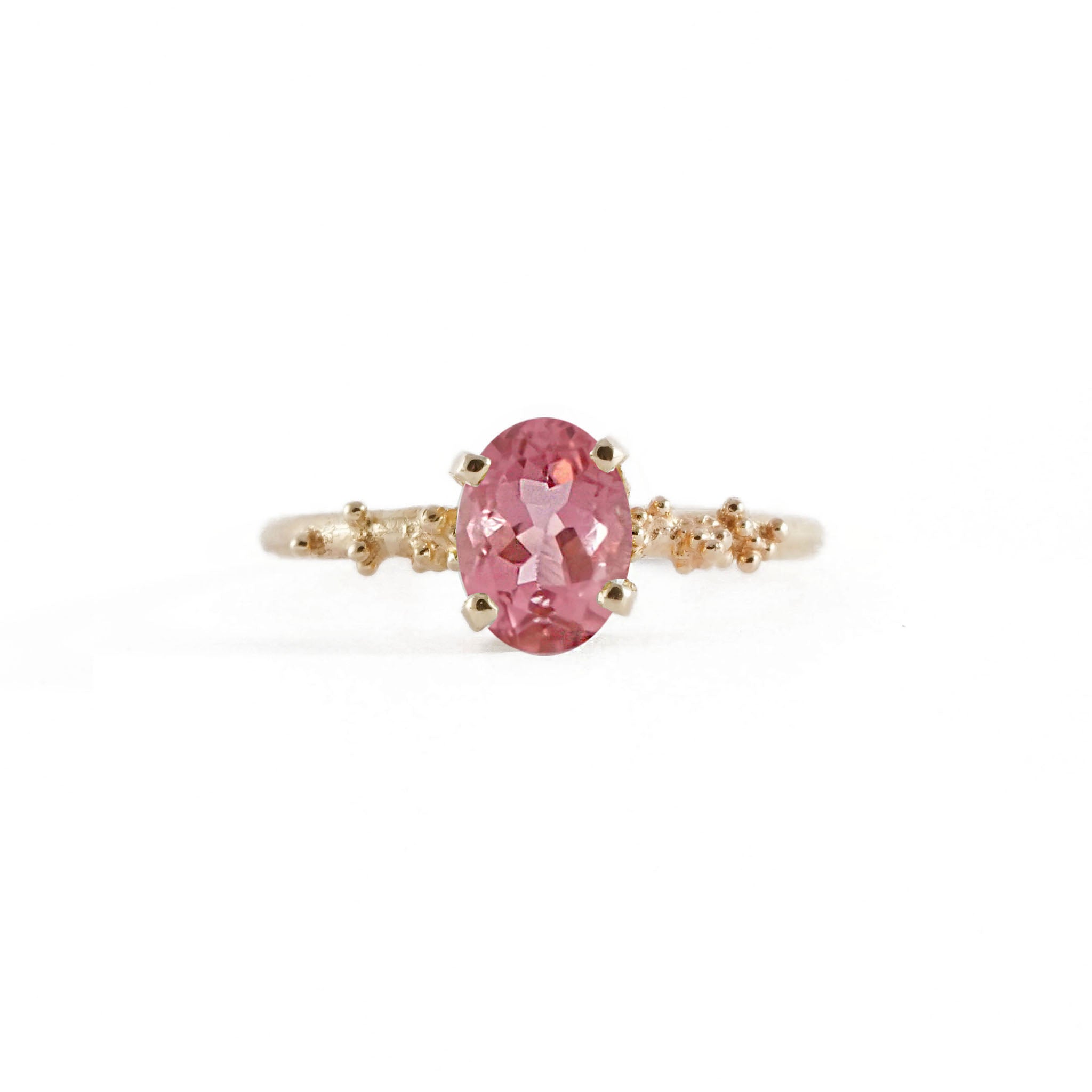 Delicate gold ring set with 8X6mm Oval Pink Tourmaline and granules