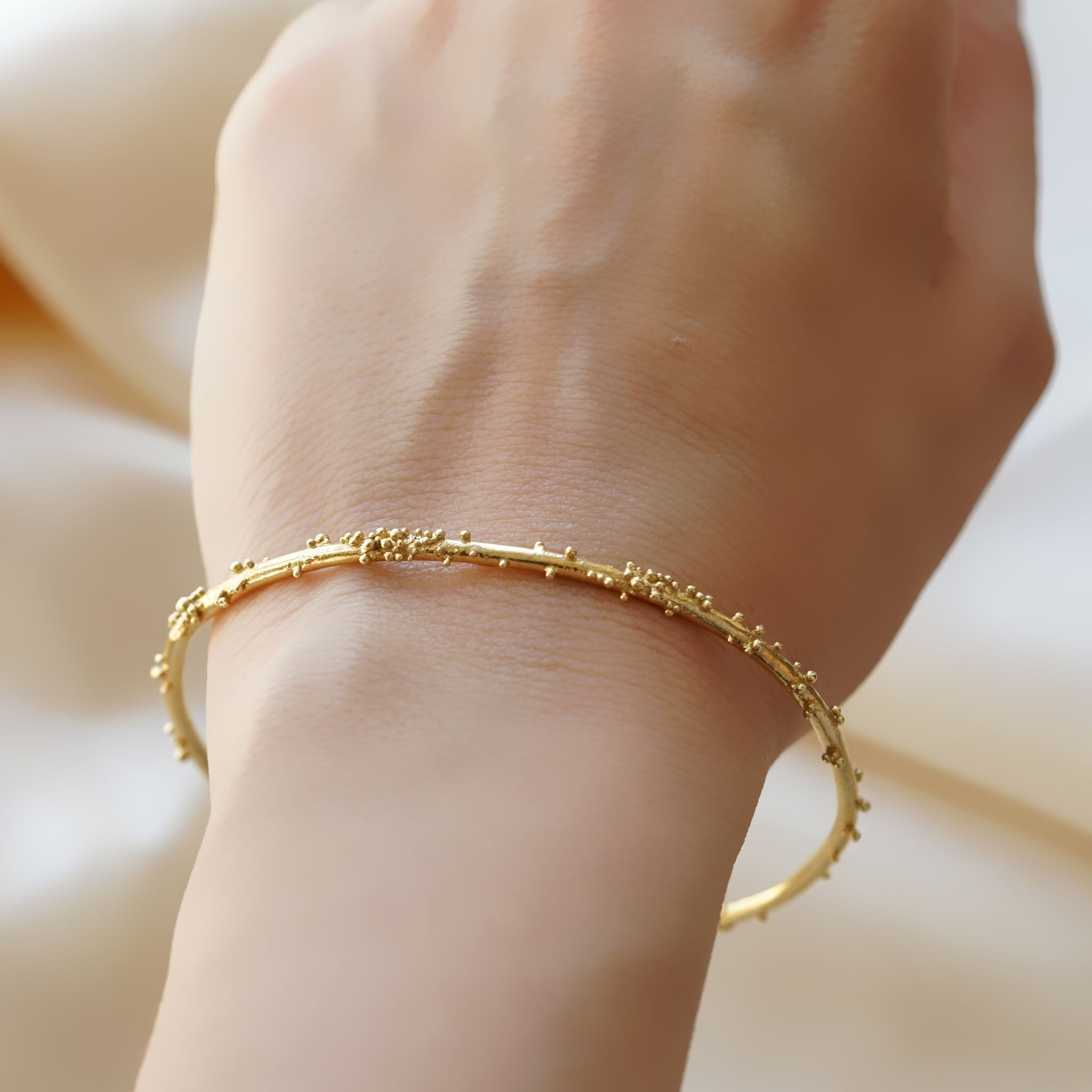 Delicate 14ct gold bracelet with granules