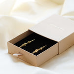 Asymmetric Drop Gold Earrings with Granules